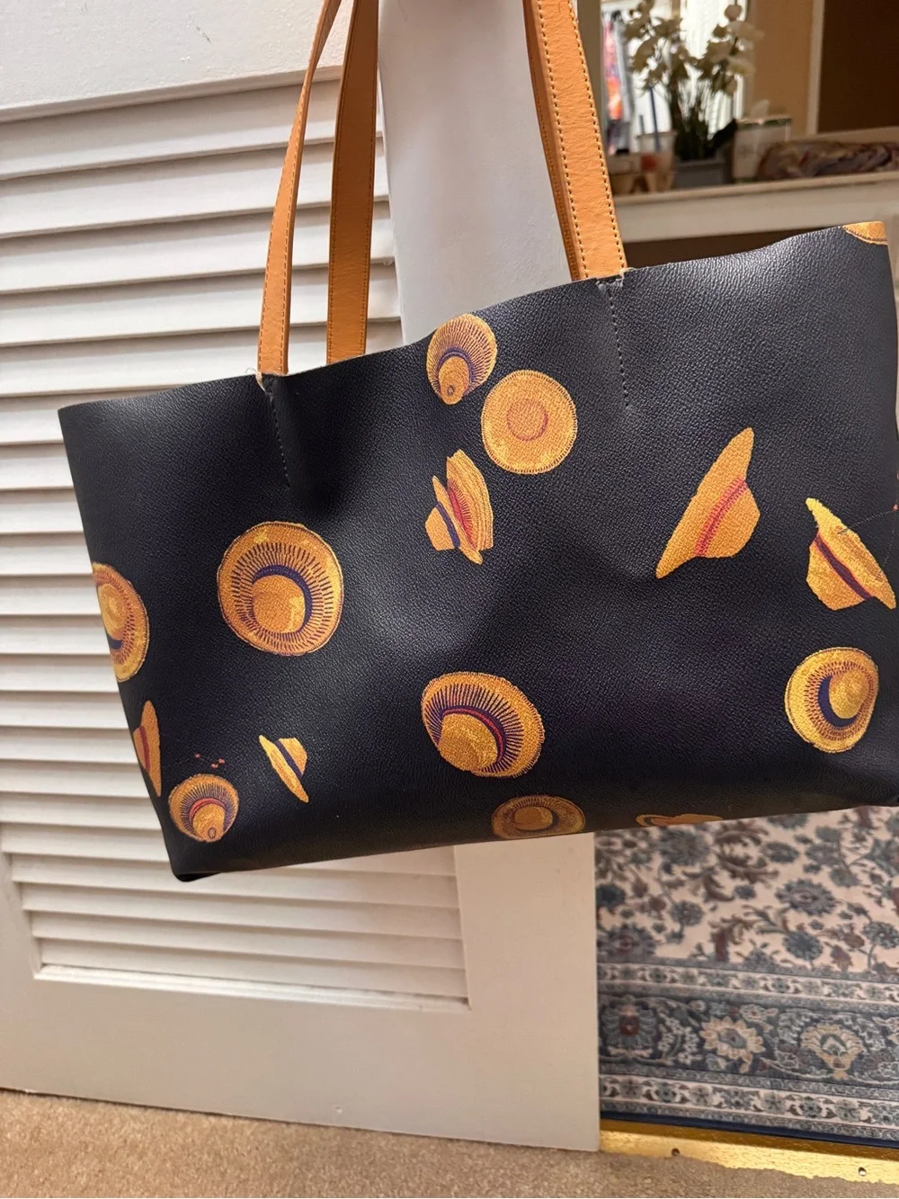 Tory Burch Black Leather Tote with Yellow Hat Motif
